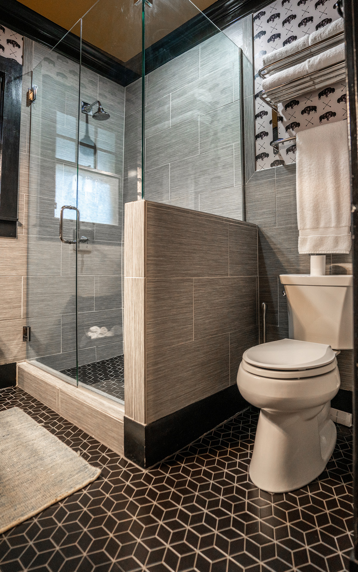 A modern bathroom with walk-in shower