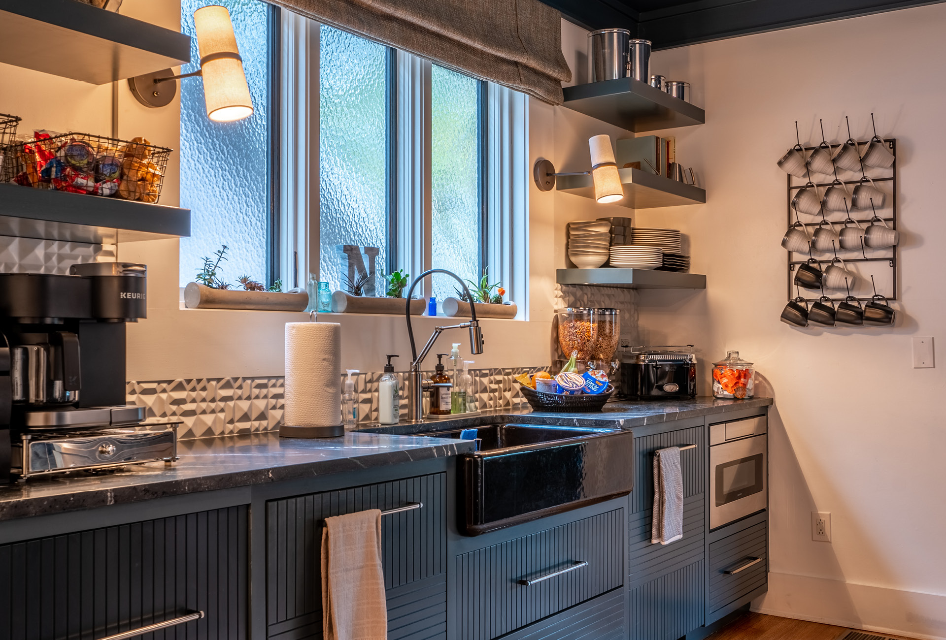 A large kitchen ready to host a gathering of family and/or friends