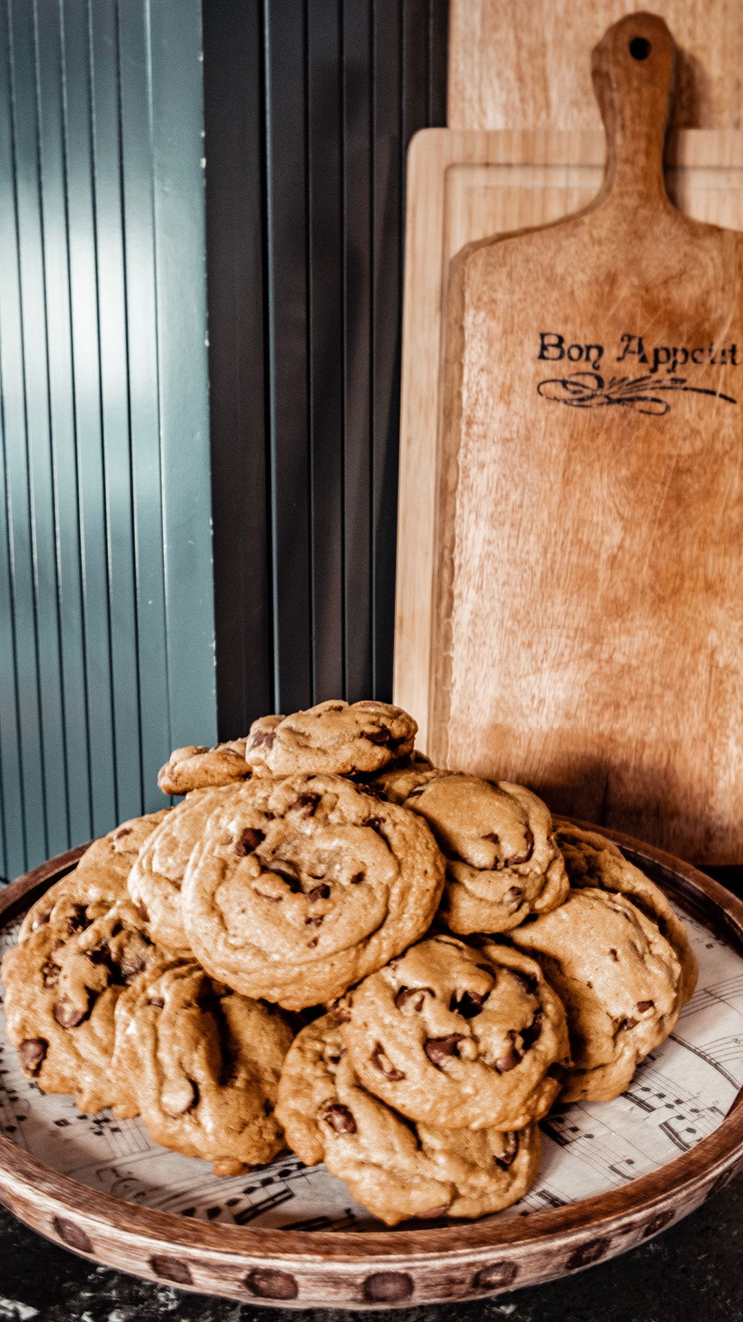 A plate of fresh-baked chocolate chip cookies